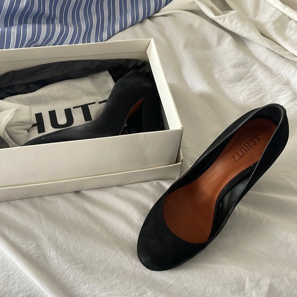 Black suede pumps